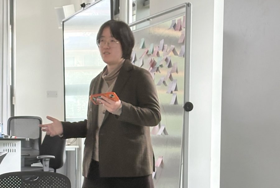 Weiwei Yi (University of Glasgow) hosting the Lightning Talks session during the conference.
